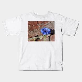 Flower Posing with a Brick Wall Photographic Image Kids T-Shirt